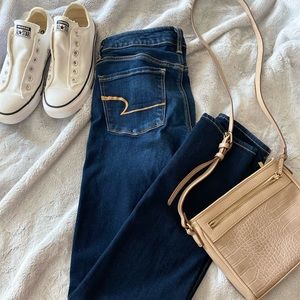 4L Dark Wash, Mid-Rise American Eagle Skinny Jeans